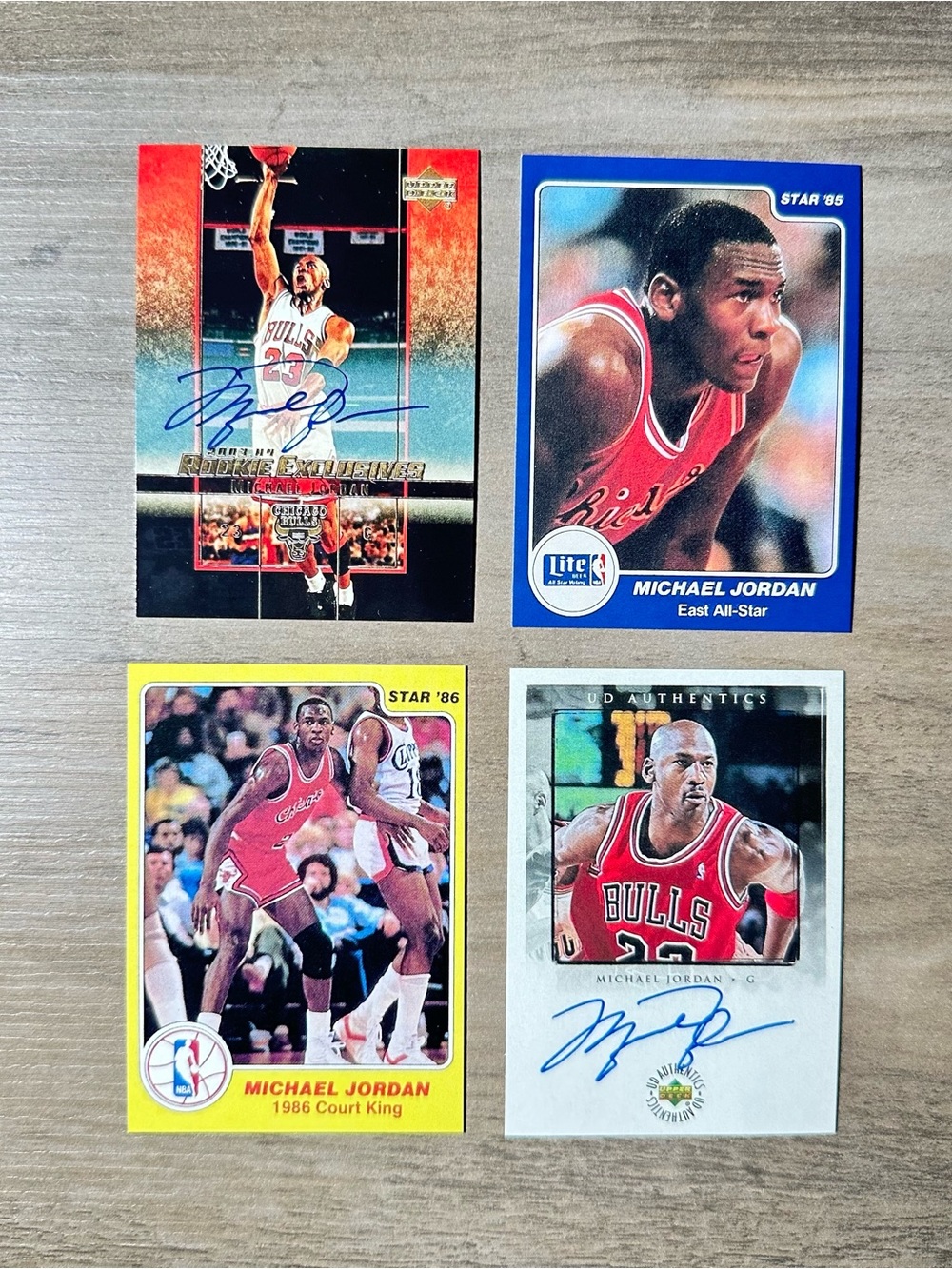 Michael Jordan Signed Rookie Lot of (4) Star Upper Deck Novelty Cards.
